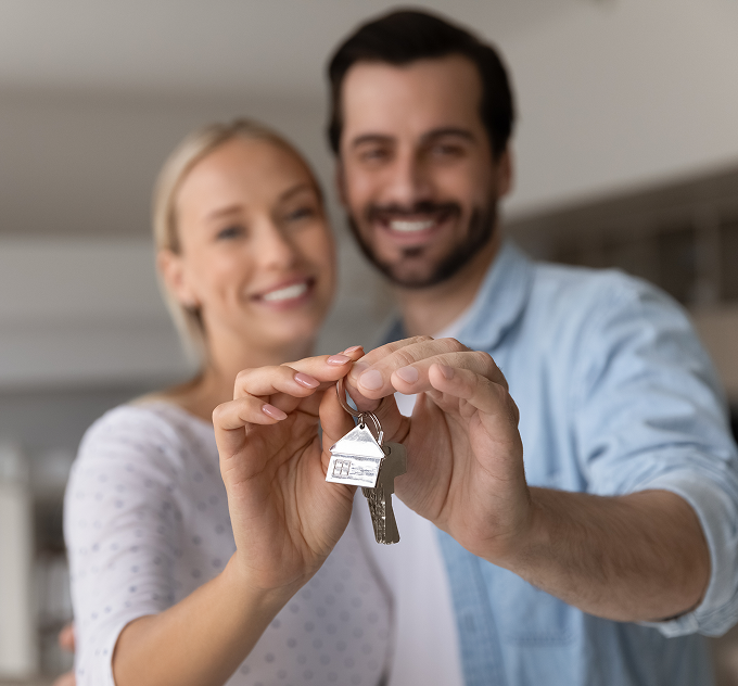 Happy Couple with Keys